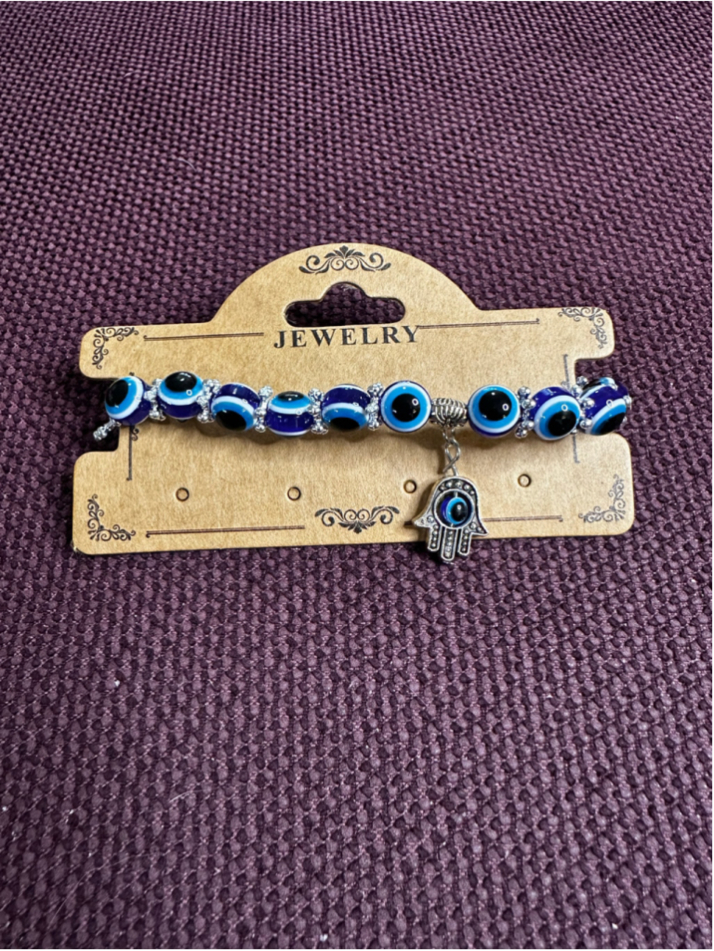 Blue and Silver Evil Eye Hamsa Charm Bracelet